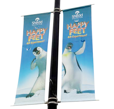 Happy Feet 4D Experience light pole banners on a street pole